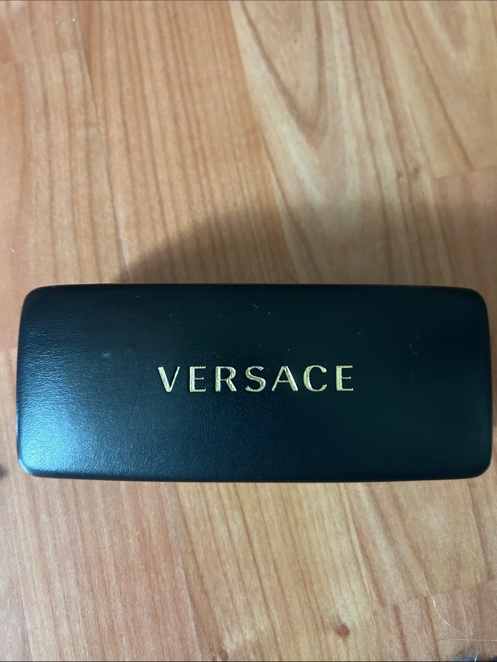 Versace Black and Gold Logo Eyewear Case with cleaning clothes